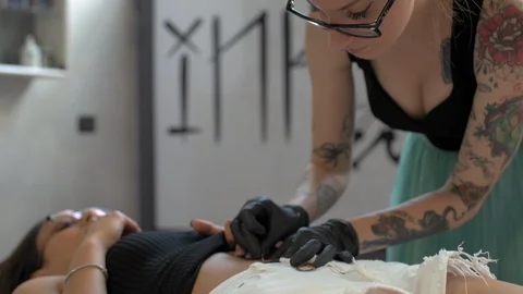 Artist piercing Stock Footage 129896758