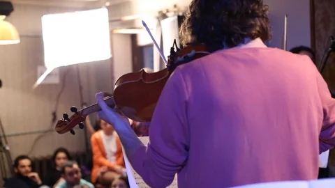 Artist playing Violin During A Classical Music Rehearsal Before A Concert 库存影片 123583323