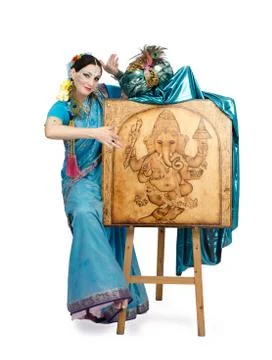 Artist posing next to easel with pyrography lord ganesha Stockfoto's