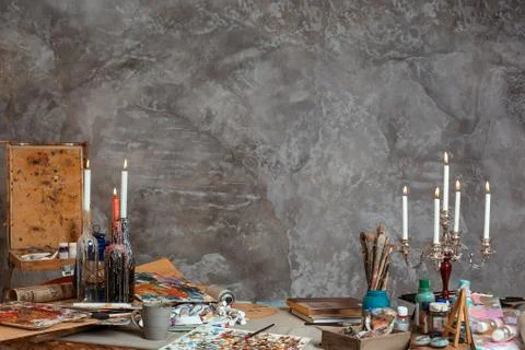 Artist studio interior. Creative concept. Drawing supplies, oil paints, artis Stock Photos