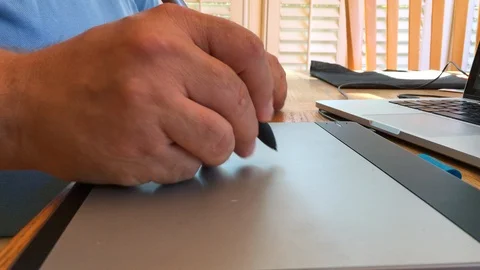 Artist using a graphic drawing tablet Stock Footage 94644470