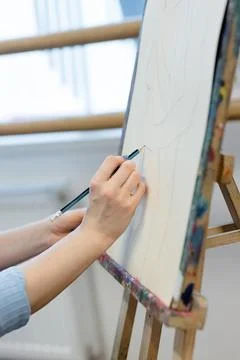 Artist at Work: Capturing Creativity on Canvas Stock Photos