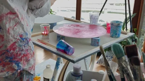 Artist at work at her studio dolly in shot Stock Footage 270746836