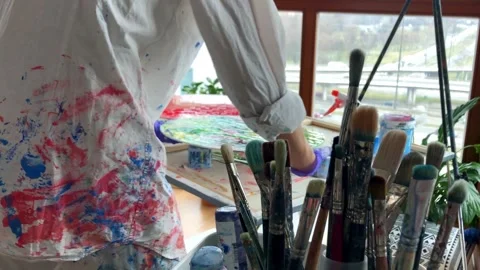 Artist at work at her studio dolly in shot Stock Footage 270748033