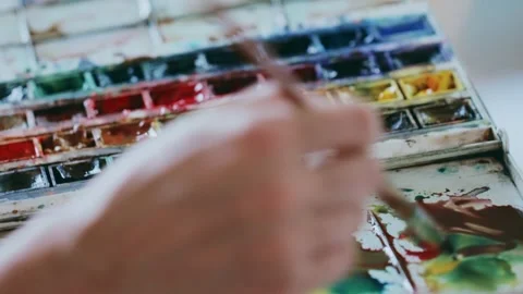An artist at work in his studio Stock Footage 258853467