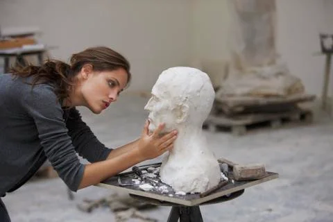 Artist working on bust Stock Photos