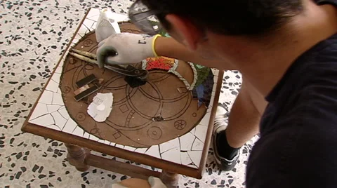 An artist is working on a mosaic Stock Footage 68019377