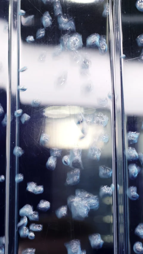 An Artistic Abstract Bubble Reflection onto a Liquid Surface with a Variety of Stock Footage 293048906