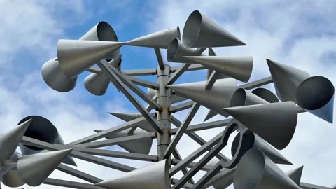 Artistic and Creative Wind Sculpture Featuring Conical Elements Set Against a Stock Footage 315013353