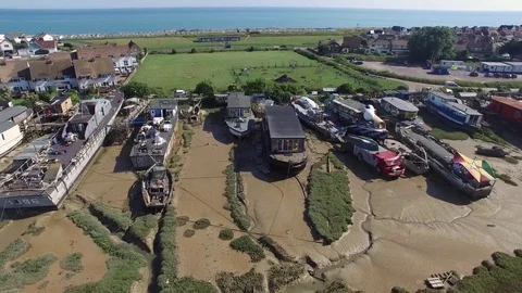 Artistic boathouses, Adur river, Shoreham-by-Sea, UK Stock Footage 77921253