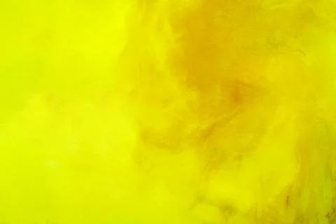 Artistic bright yellow background with soft orange paint splatters and text.. Stock Photos