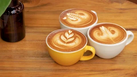 Artistic Coffee Brewing. Creating Beautiful Latte Art. Latte Techniques. 4K Stock Footage 244879024