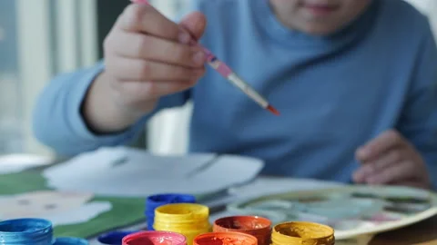 Artistic concept. Child in the process of drawing 스톡 동영상 166001289