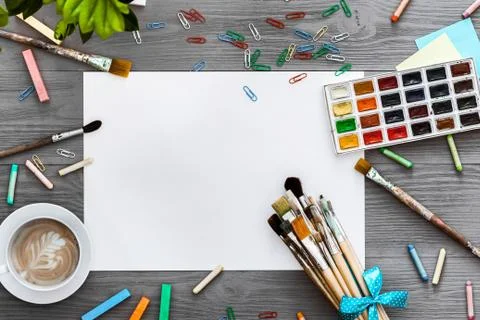Artistic creative background art work supplies and mockup blank paper, flat lay Stock Photos