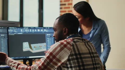 Artistic digital technicians talking about machine development Video stock 233542501