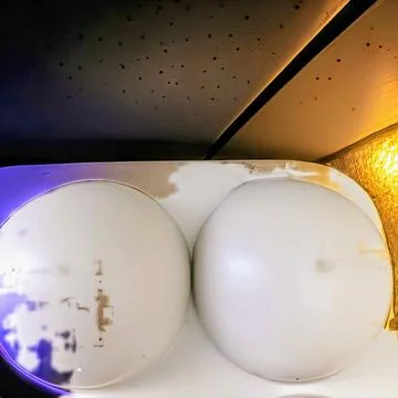 Artistic Eggs By The Wall Stock Photos
