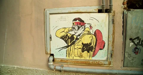 Artistic Graffiti Painted on Utility Box Cover in Street Alley Stock Footage 203910515