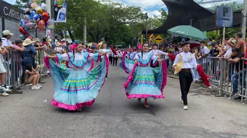 An artistic group presenting a choreography at the San Pedro Festival Stock Footage 312835709