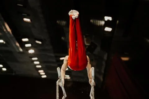 Artistic gymnastics exercise parallel bars Stock Photos