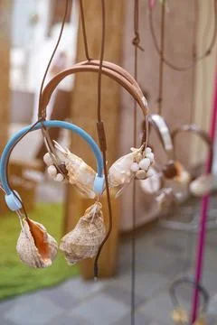 Artistic headsets crafted from various shells. Symbol of tranquility, silence 库存照片