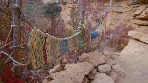 Artistic installation made with coloured pieces of rope in climbing area Stock Footage 289294935