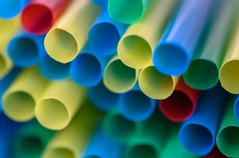 Artistic Macro Perspective of Neon Plastic Straw Openings Stock Photos