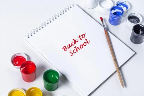 Artistic mock-up on white background with text back to school. Drawing tools Stock Photos