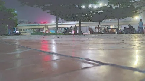 Artistic pencil-like motion effect over a city night scene with glowing stre Stock Footage 320189873