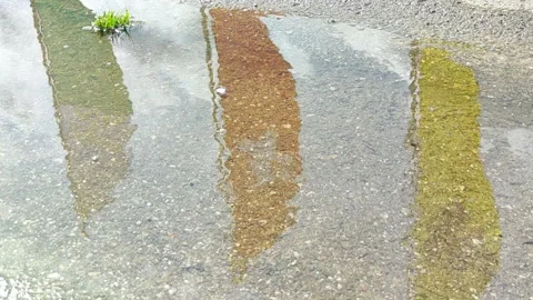 An artistic perspective capturing reflections of Switzerland flag Stock Footage 315214851