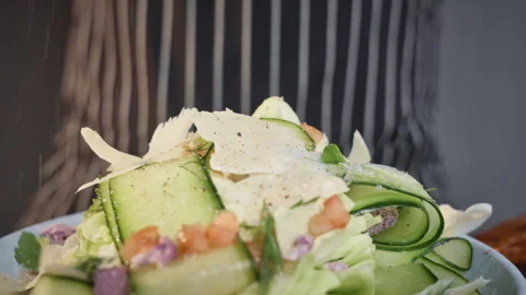 Artistic plated vegetable salad with parmesan and accents Video stock 324789062