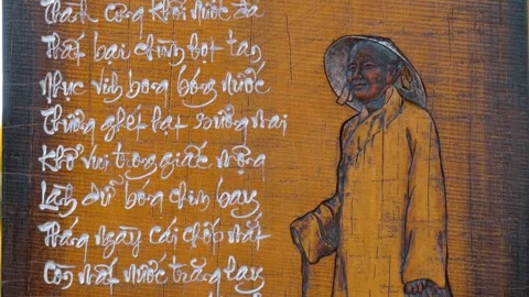 Artistic representation of Vietnamese calligraphy and a walking away monk 스톡 동영상 333375177