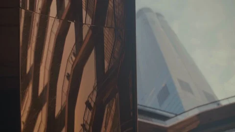 Artistic shot of The Vessel and Skyscraper in background Stock Footage 120530516