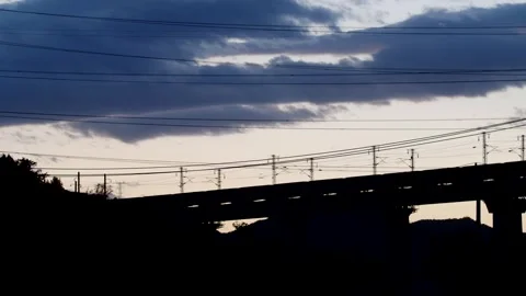 Artistic Slow Motion of Train Wheels Clattering on Rustic Iron Rails Stock Footage 304312643