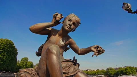 Artistic statues decorating Pont Alexandre III bridge in Paris Stock Footage 313779519