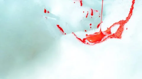 Artistic texture of red paint falling in foam, puddle and blood falling in foam Stock Photos