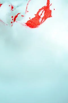 Artistic texture of red paint falling in foam, puddle and blood falling in foam Stock Photos