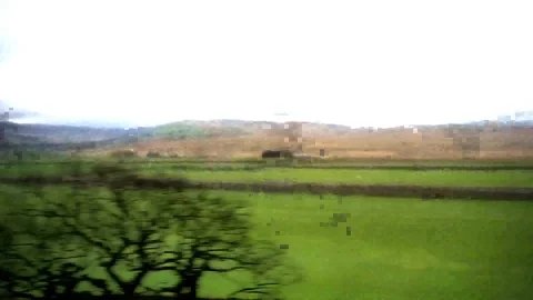 Artistic window view from a train window in England countryside Stock Footage 93501324