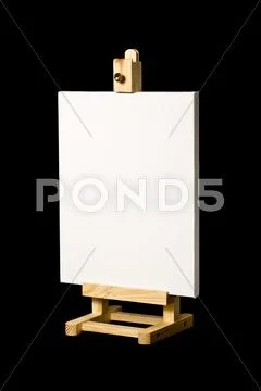 Artist's canvas on easel isolated on black Stock Photos