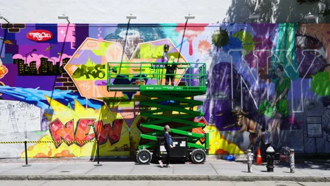 Artists crate mural on the building wall at NOHO in New York Video stock 138239622