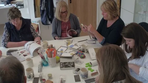 Artists discuss working on their next project Stock Footage 76881904