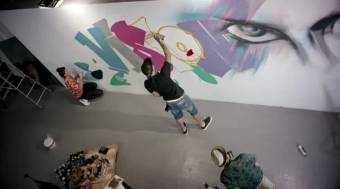 Artists doing graffiti on wall. Stock Footage 63427539