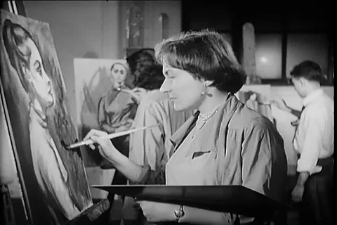 Artists draw sketch of model in workshop - 1950 Stock Footage 99098471