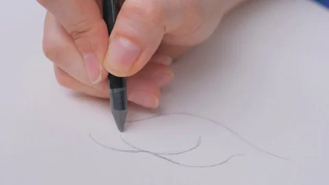 Artists hand drawing with graphite pencil lines on paper. Stockbeeldmateriaal 78065904