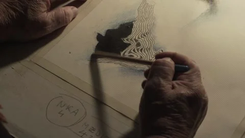 An artist's hand at work, drawing Stock Footage 166634767