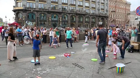 Artists organize an attraction with soap bubbles in St. Petersburg Stock Footage 67565077
