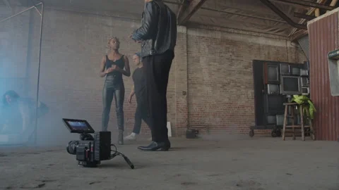 Artists Talk While Crew Sets Up Shot Stock Footage 270328290