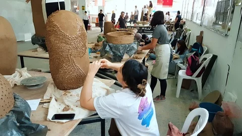 Artists working in an atelier during the 12th International Eskisehir Terra Stock Footage 104031835