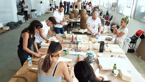 Artists working in an atelier during the 12th International Eskisehir Terra Stock Footage 104032584