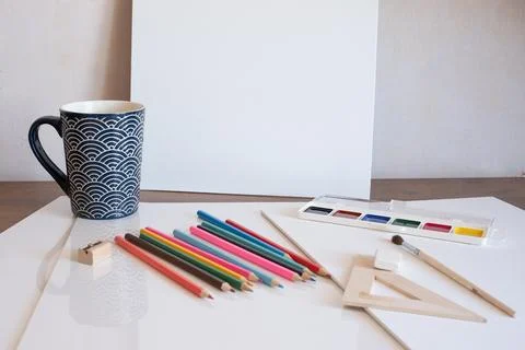 Artists workspace arranged for imminent creative work in a quiet studio setti Stock Photos