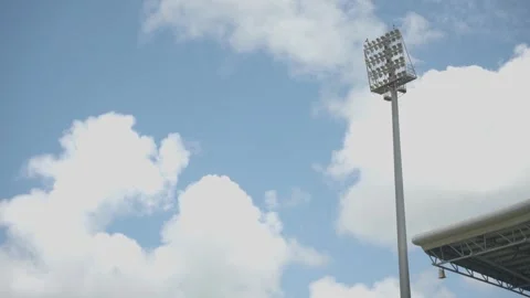Artsy shot of a light pole or tower at a sports stadium, with the corner Stock Footage 285135902